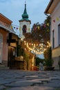 City square with beautiful city lights in Szentendre Hungary next to Budapest with colorful banner light decorations