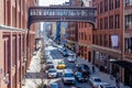 City street in Chelsea with yellow taxi cab, aerial view from the High Line Rooftop Park, New York City Royalty Free Stock Photo