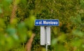 Plaque with the city coat of arms (Ostrowiec Swietokrzyski) with the name of the street (Apricot) . Royalty Free Stock Photo