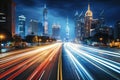 A city street with heavy traffic and bright lights, bustling with cars and buses at night, The light trails on a modern building Royalty Free Stock Photo