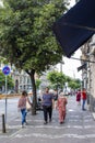 City Street in the Historical Center of Naples. View of Buildings, Road, People in the City, Naples, Italy