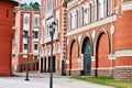 City street with houses of red and white brick. Russia Yoshkar Ola 01.05.2021