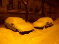 City street in the lights of the night illumination with automobiles Royalty Free Stock Photo