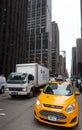 City street scene with a yellow taxi cabs Royalty Free Stock Photo