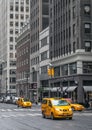 City street scene with a yellow taxi cabs Royalty Free Stock Photo