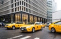 City street scene with a yellow taxi cabs Royalty Free Stock Photo