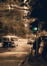 City street in vintage color with an accent on traffic light on green Royalty Free Stock Photo