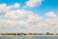 City summer landscape near lake cloudy sky Royalty Free Stock Photo