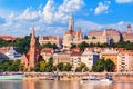 City summer landscape - view of the Buda Castle, palace complex on Castle Hill with Matthias Church over the Danube river Royalty Free Stock Photo