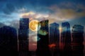 City on sunset  modern buildings silhouette of the blue  night  and moon light and houses at  pink  sunset blue cloudy night sky t Royalty Free Stock Photo