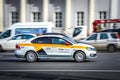 City taxi Yandex speeding along the main street of the city. Motion blur. Moscow, Russia - April 5, 2019