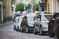 City traffic with cars parked in line on street side