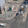 City traffic - cars and people on street aerial