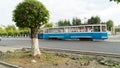 City tram on the street of Temirtau, Kazakhstan. The old tram on the road is on a straight section of the road along