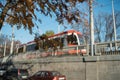 sunday autumn day city transport cars road tram blue sky sunlight