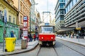 City transport in Prague. Tram on the street of the old city