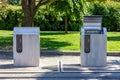 City trash can. Trash bin on the street. Iron trash can.