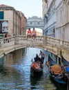 City trip Venice Italy view of the bridge of Sighs with a gondola boat under the bridge with tourist Royalty Free Stock Photo