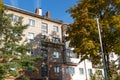 City Tula. Russia - July 24 , 2021A mans house painters paint a residential building on a front lift