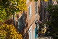 City Tula. Russia - September 29 , 2021A mans house painters paint a residential building on a front lift