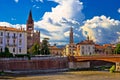 City of Verona Adige river San Fermo Maggiore church and Lambert