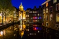 City view of Amsterdam, the Netherlands with Amstel river at night Royalty Free Stock Photo
