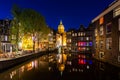 City view of Amsterdam, the Netherlands with Amstel river at night Royalty Free Stock Photo