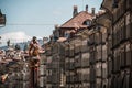 City view of Bern Switzerland with houses and the statue of Samson and the lion on the left Royalty Free Stock Photo