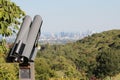 City view with giant public binoculars point towards the skyline of Frankfurt