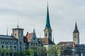 City view of old downtown at the bank of Limmat River of Zurich city, with beautiful house, and Church of  Fraumunster Royalty Free Stock Photo