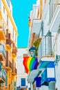 City views and gay flags on buildinds in a small town in the out Royalty Free Stock Photo