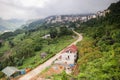 City village view around green mountain Royalty Free Stock Photo