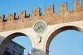 The city wall with a clock in Verona