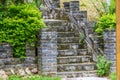 City wall stairs made of blue bricks and green plants outdoors Royalty Free Stock Photo