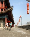 City Wall, Xian, Shaanxi Province, China. People cycling on the top of Xian city wall.