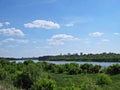 City of Warsaw Panorama Hidden behind Trees across Vistula River, Warsaw, Poland