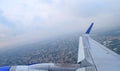 City and Wing of the Aircraft from Window - Aviation Industry and Travel in Flight