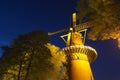 City's old windmill in Utrecht illuminated at night Royalty Free Stock Photo