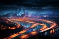Citys vivid palette shines on a bustling overpass interchange at night Royalty Free Stock Photo