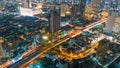 Cityscape aerial view timelapse at night bangkok, Busy traffic across main road at rush hour thailand.