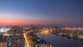 Cityscape of Ajman from rooftop day to night timelapse. Ajman is the capital of the emirate of Ajman in the United Arab Emirates.