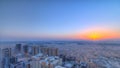 Cityscape of Ajman from rooftop with sunrise timelapse. Ajman is the capital of the emirate of Ajman in the United Arab Emirates.