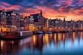 Cityscape of Amsterdam at sunset, Holland, Netherlands. Colorful houses and canals, Amsterdam Netherlands dancing houses over Royalty Free Stock Photo