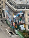 Cityscape from Arc de Triomphe in Paris, France with the mural of the 2023 World Rugby Cup