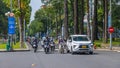 Cityscape of the asian metropolis Saigon. Scooters and motorcycles characterise road traffic Royalty Free Stock Photo