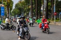 Cityscape of the asian metropolis Saigon. Scooters and motorcycles characterise road traffic Royalty Free Stock Photo