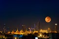 Cityscape of bangkok night view with super moon. Bangkok night view in the business location. Bangkok, Thailand Royalty Free Stock Photo