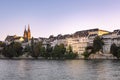 Cityscape of Basel in Switzerland by Rhine river. View on the old town architecture and Basel Minster. Buildings on the river bank