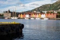 Cityscape of the Bergen city in Norway with ships and pier