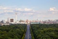 Cityscape of Berlin and road in Tiergarten park